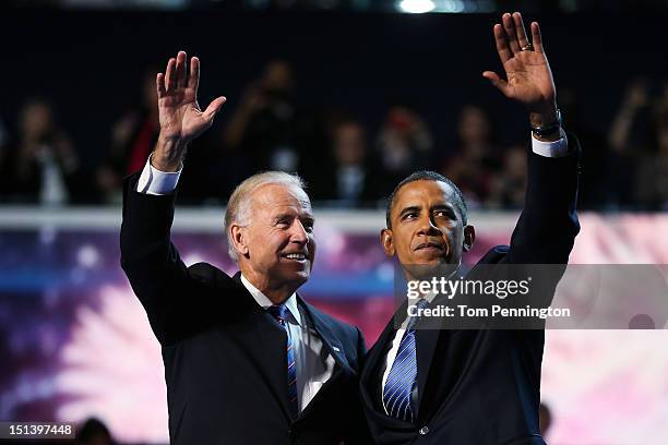 Democratic presidential candidate, U.S. President Barack Obama and Democratic vice presidential candidate, U.S. Vice President Joe Biden wave after...