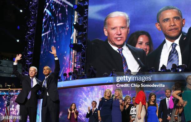 Democratic presidential candidate, U.S. President Barack Obama and Democratic vice presidential candidate, U.S. Vice President Joe Biden wave after...