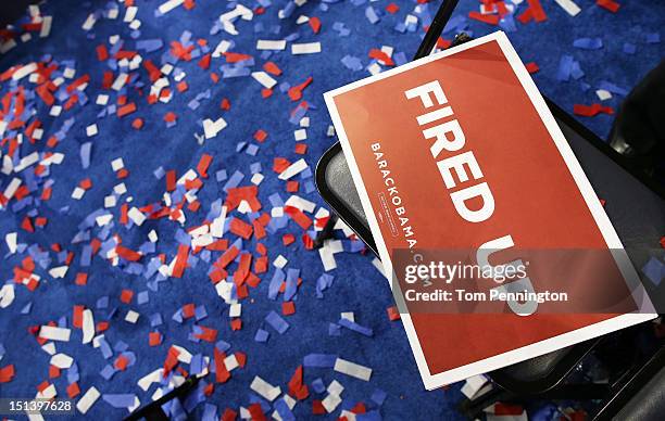 Signs and confetti sit on the floor after Democratic presidential candidate, U.S. President Barack Obama accepted the nomination during the final day...