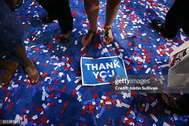 Signs and confetti sit on the floor after Democratic presidential candidate, U.S. President Barack Obama accepted the nomination during the final day...