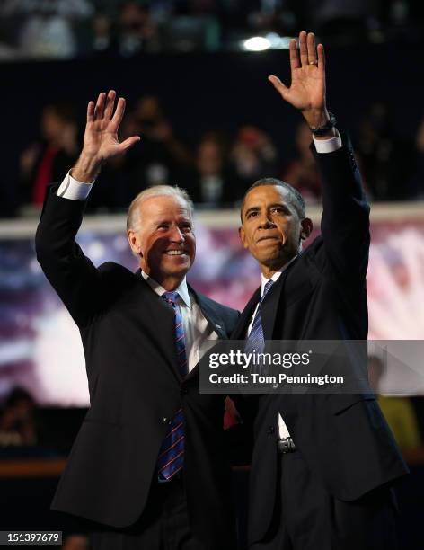 Democratic presidential candidate, U.S. President Barack Obama and Democratic vice presidential candidate, U.S. Vice President Joe Biden wave after...