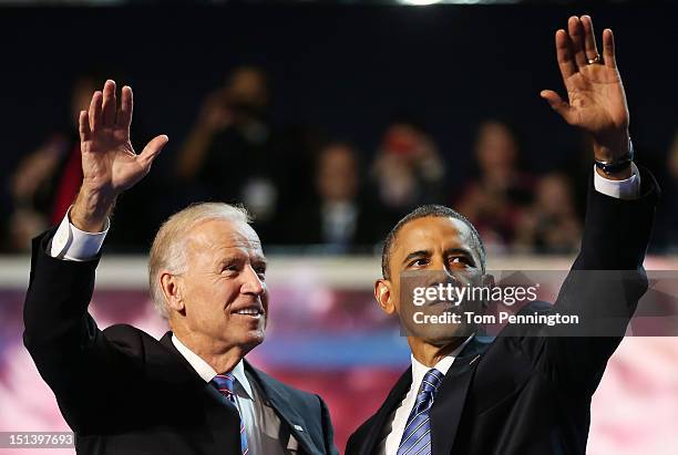 Democratic presidential candidate, U.S. President Barack Obama and Democratic vice presidential candidate, U.S. Vice President Joe Biden wave after...