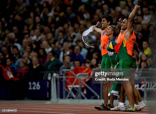 Silver medallists Jerusa Gerber Santos of Brazil and guide Luiz Henrique Barboza Da Silva, bronze medallists Jhulia Santos of Brazil and guide Fabio...