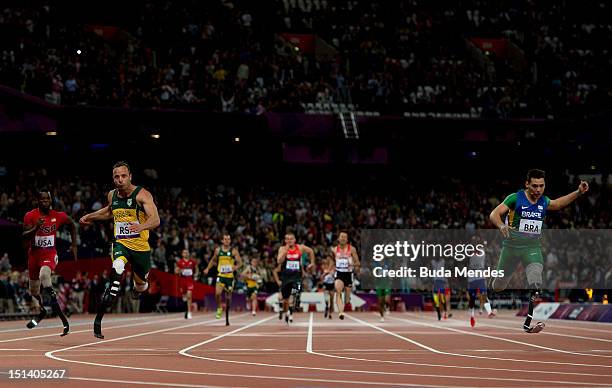 Oscar Pistorius of South Africa crosses the line to win gold for this team in the Men's 4x100m relay T42/T46 Final on day 7 of the London 2012...