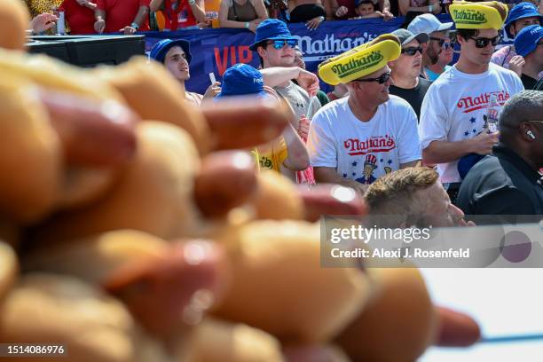 Spectators look on ahead of the 2023 Nathan's Famous Fourth of July International Hot Dog Eating Contest at Coney Island on July 04, 2023 in the...