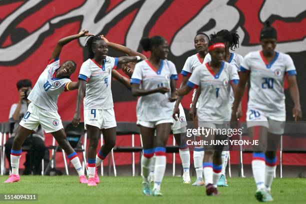 Haiti's Nérilia Mondésir celebrates scoring her team's first goal during the women's international friendly football match between South Korea and...