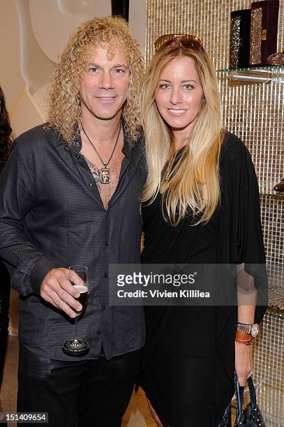 Rrecording artist David Bryan and his wife Lexi Quaasattend Stuart Weitzman Hosts Fashion's Night Out with Special Guest Appearance by Petra Nemcova...