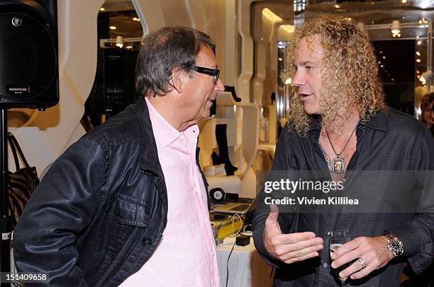Fashion designer Stuart Weitzman and recording artist David Bryan attends Stuart Weitzman Hosts Fashion's Night Out with Special Guest Appearance by...