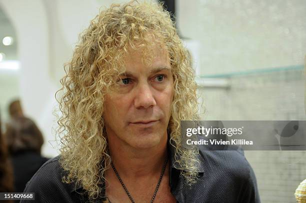 Recording artist David Bryan attends Stuart Weitzman Hosts Fashion's Night Out with Special Guest Appearance by Petra Nemcova at Stuart Weitzman...