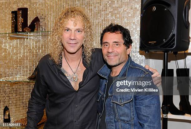 Recording artist David Bryan and David Lipman attend Stuart Weitzman Hosts Fashion's Night Out with Special Guest Appearance by Petra Nemcova at...