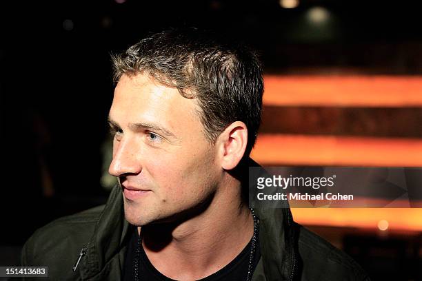 Ryan Lochte gives an interview during Ryan Lochte Hosts "Guys Fashions Night Out" Presented By Ainsworth Park and Windsor Custom on September 6, 2012...