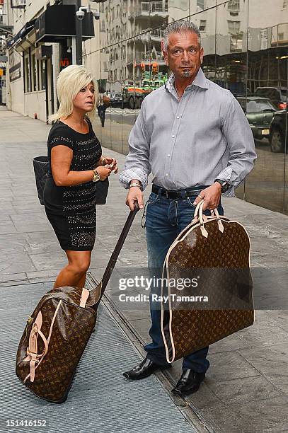 Personalities Theresa Caputo and Larry Caputo leave the "Good Day New York" taping at the Fox 5 Studios on September 6, 2012 in New York City.