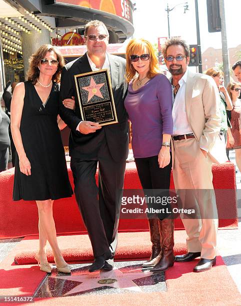 Musicians Amy Grant, Vince Gill, Reba McEntire and producer Tony Brown participate in the Star ceremony Honoring Vince Gill On The Hollywood Walk Of...