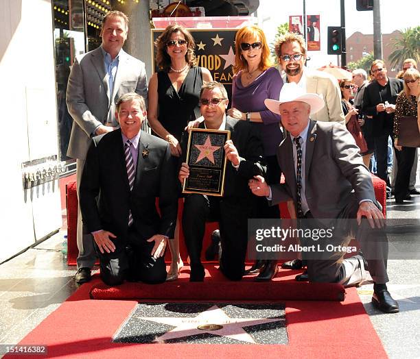 Chairman Christopher Barton, musician Amy Grant, musician Reba McEntire, producer Tony Brown, WOF CEO Leron Gubler, musician Vince Gill and...