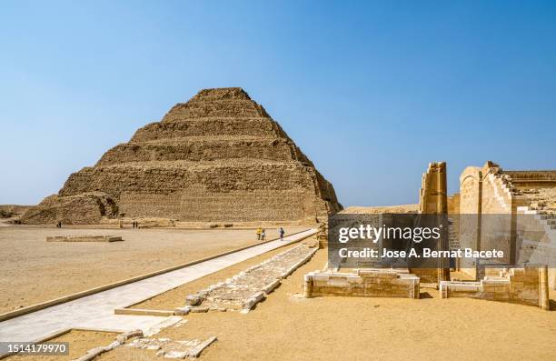 ruins of a temple next to the step pyramid of zoser in saqqara, memphis, egypt. - saqqara stock pictures, royalty-free photos & images