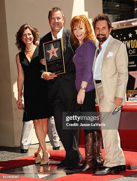 Amy Grant, Vince Gill, Reba McEntire and Tony Brown attend Gill's induction into the Hollywood Walk of Fame on September 6, 2012 in Hollywood,...