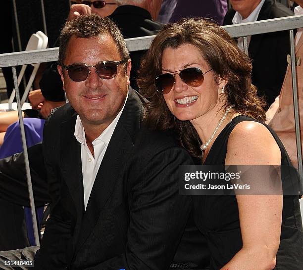 Vince Gill and Amy Grant attend Gill's induction into the Hollywood Walk of Fame on September 6, 2012 in Hollywood, California.