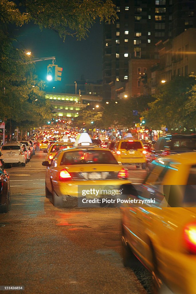 Yellow cabs at night, Manhattan, New York City