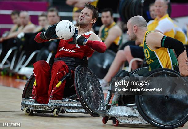 September 7: Peter Genyn of Belgium passes the ball during the Mixed Wheelchair Rugby - Open match between Australia and Belgium on Day 9 of the...