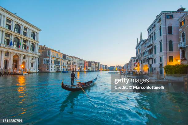 italy, veneto, venice, gondola on canal grande - venice italy stockfoto's en -beelden