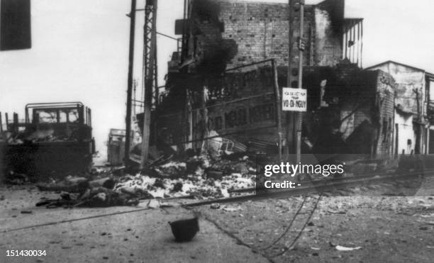 South Vietnamese lie dead beside a destroyed house, near Saigon's airport, 03 February 1968. The beginning of the Vietcong's lunar new year was...