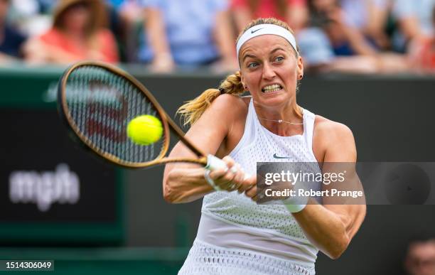 Petra Kvitova of the Czech Republic in action against Natalija Stevanovic of Serbia in the third round during Day Six of The Championships Wimbledon...