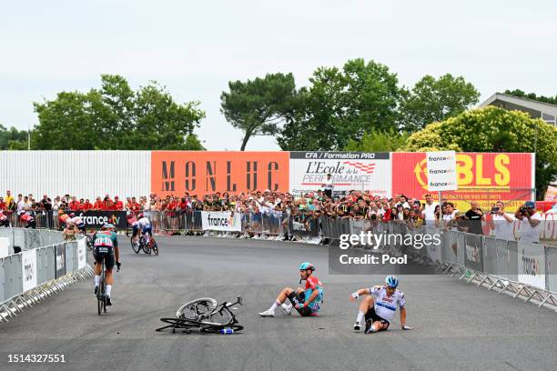 Jacopo Guarnieri of Italy and Team Lotto Dstny and Fabio Jakobsen of The Netherlands and Team Soudal - Quick Step after being involved in a crash...