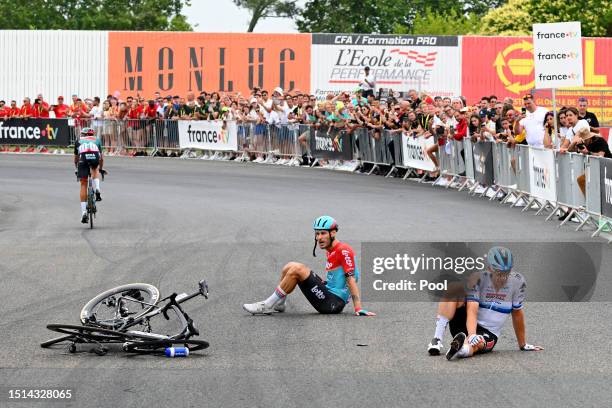 Jacopo Guarnieri of Italy and Team Lotto Dstny and Fabio Jakobsen of The Netherlands and Team Soudal - Quick Step after being involved in a crash...