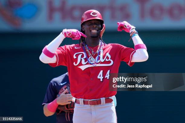 Elly De La Cruz of the Cincinnati Reds celebrates after advancing to second base on a single against the Washington Nationals during the first inning...