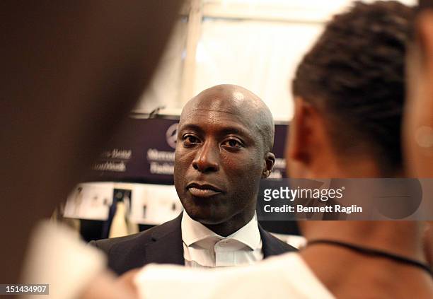 Designer Ozwald Boateng attends the Arise show during Spring 2013 Mercedes-Benz Fashion Week at The Theatre Lincoln Center on September 6, 2012 in...