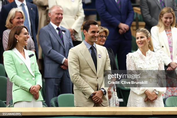 Catherine, Princess of Wales, former Wimbledon Champion, Roger Federer of Switzerland and his wife Mirka Federer react from the Royal Box following...