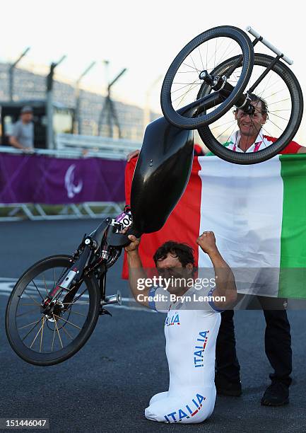 Alessandro Zanardi of Italy celebrates winning the Men's Individual H4 Road Race on day 9 of the London 2012 Paralympic Games at Brands Hatch on...