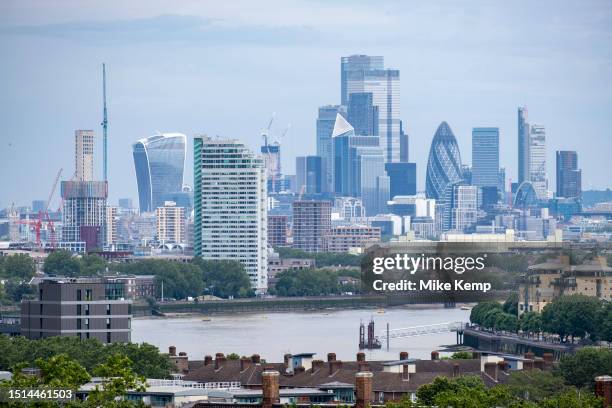 Skyline view of the City of London financial district from the viewpoint in Greenwich Park on 8th July 2023 in London, United Kingdom. The City of...