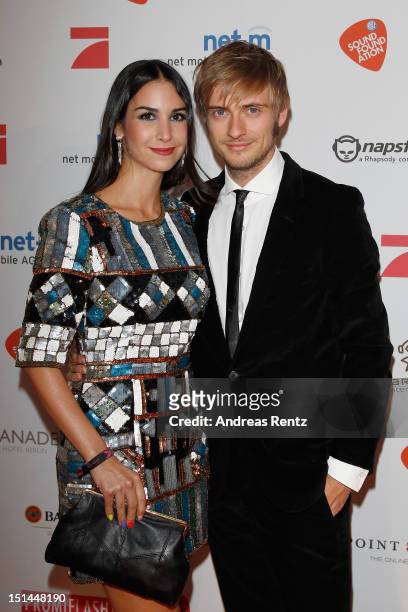 Sila Sahin and Joern Schloenvoigt attend the music meets media party on September 7, 2012 in Berlin, Germany.