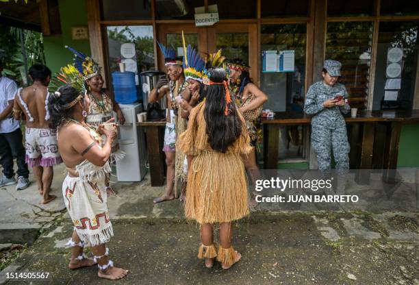 Colombian indigenous people wait for the arrival of presidents Gustavo Petro of Colombia and Luiz Inacio Lula da Silva of Brazil for a meeting on the...