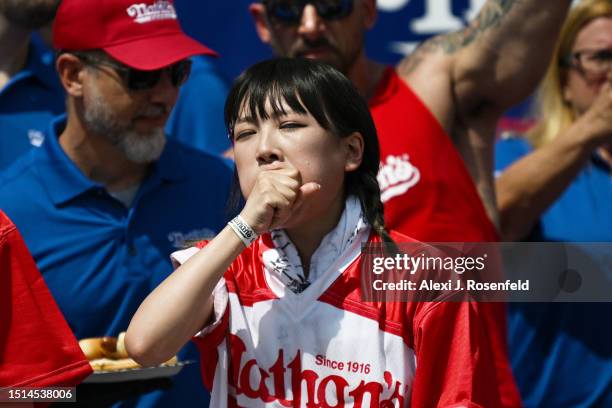 Mayoi Ebihara competes during the 2023 Nathan's Famous Fourth of July International Hot Dog Eating Contest at Coney Island on July 04, 2023 in the...