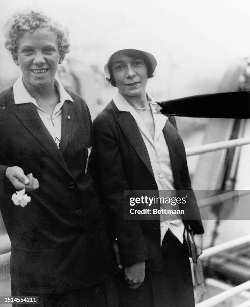 Georgia Coleman and Lauretta Hunsberger; high divers of the Olympic women's swimming team, sailing with the other members on the S.S. President...