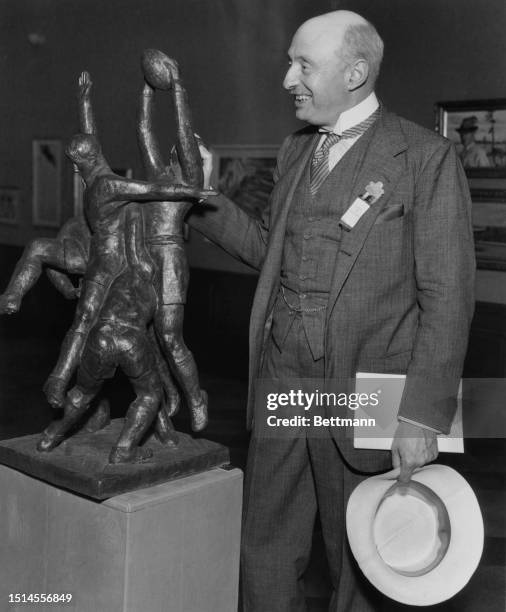 Count Henri de Baillet-Latour; president of the International Olympic Committee and president of the Belgium Olympic Committee, inspects statute at...