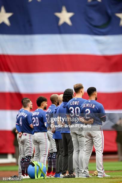 The Texas Rangers lineup during the National Anthem before a game against the Boston Red Sox Fenway Park on July 04, 2023 in Boston, Massachusetts.