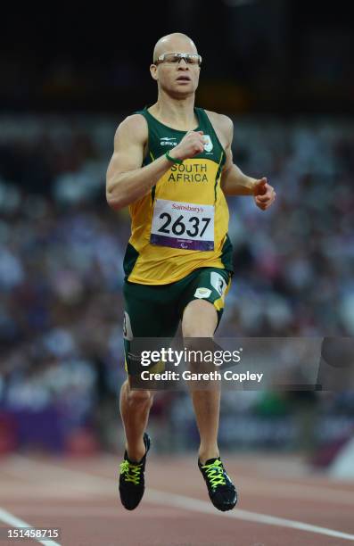 Hilton Langenhoven of South Africa competes in the Men's 200m T12 semi finalson day 9 of the London 2012 Paralympic Games at Olympic Stadium on...