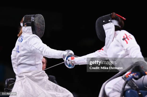 Dagmara Witos-Eze of Poland in action with Pui Shan Fan of Hong Kong, China during the Women's Team Wheelchair Fencing on day 9 of the London 2012...