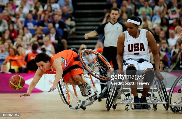 Inge Huitzing of Netherlands is fouled by Andrea Woodson-Smith of United States during the Women's Wheelchair Basketball Bronze Medal match between...
