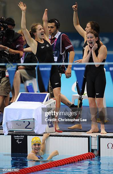 Jacqueline Freney, Annabelle Williams, Ellie Cole and Katherine Downie of Australia celebrate winning the gold in the Women's 4x100m Medley Relay -...