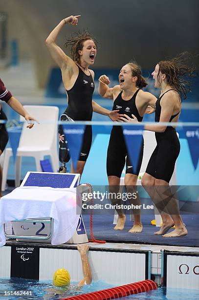 Jacqueline Freney, Ellie Cole, Annabelle Williams and Katherine Downie of Australia celebrate winning the gold in the Women's 4x100m Medley Relay -...