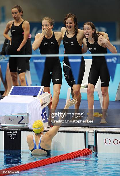 Jacqueline Freney, Annabelle Williams, Ellie Cole and Katherine Downie of Australia celebrate winning the gold in the Women's 4x100m Medley Relay -...