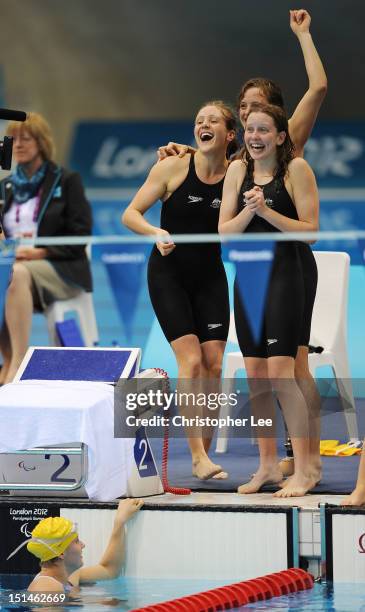 Jacqueline Freney, Annabelle Williams, Ellie Cole and Katherine Downie of Australia celebrate winning the gold in the Women's 4x100m Medley Relay -...