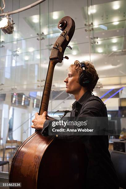 Bassist Chris Wood of Medeski, Martin & Wood performs during Medeski, Martin & Wood on SiriusXM's Jam_On and Real Jazz channels in the SiriusXM...