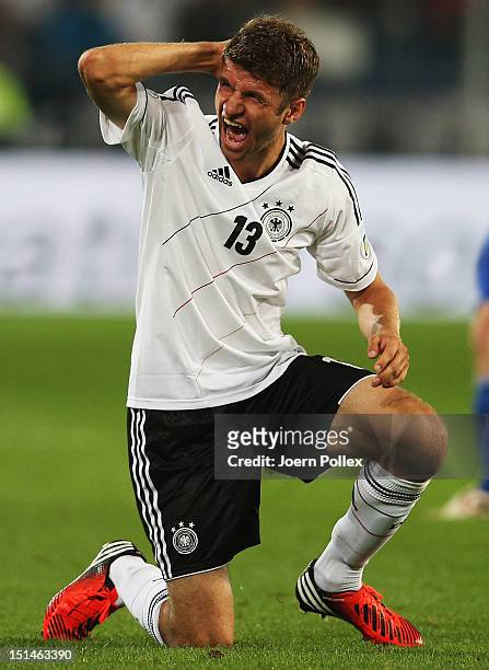 Thomas Mueller of Germany reacts during the FIFA 2014 World Cup Qualifier group C match between Germany and Faeroe Islands at AWD Arena on September...