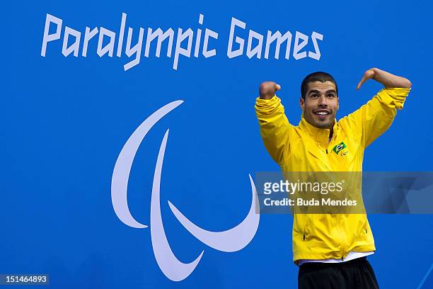Daniel Dias of Brazil celebrates a victory in the Men's 50m Butterfly - S5 final on day 9 of the London 2012 Paralympic Games at Aquatics Centre on...