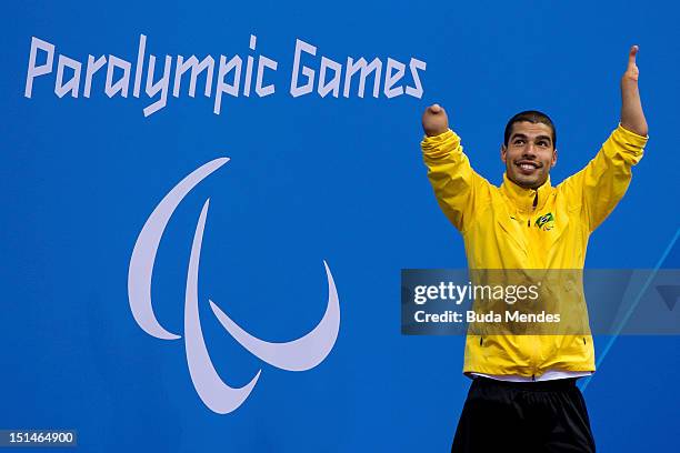 Daniel Dias of Brazil celebrates a victory in the Men's 50m Butterfly - S5 final on day 9 of the London 2012 Paralympic Games at Aquatics Centre on...